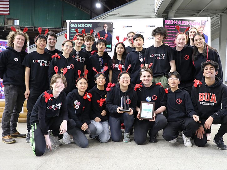Kendree Chen '21 with her robotics team members